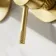 Suir Brushed Brass Wall Mounted Basin Mixer Tap with Knurled Detailing