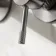 Suir Brushed Gunmetal Wall Mounted Basin Mixer Tap with Knurled Detailing