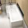 L Shaped 1700 Shower Bath with Front Panel & 6mm Easy Clean Screen with Rail - Left Handed
