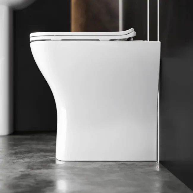 Atlanta Rimless Comfort Height Back To Wall Toilet With Premium Soft Close Slim Seat
