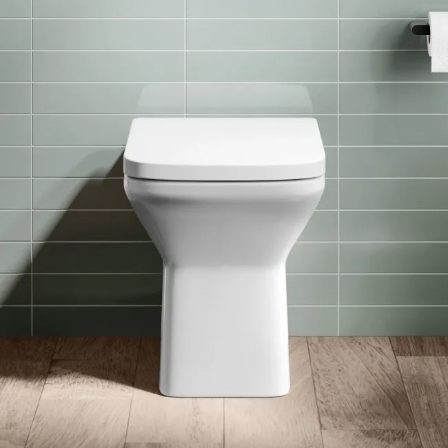 Dallas Rimless Back To Wall Toilet With Soft Close Seat