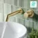 Ennis Brushed Brass Wall Mounted Basin Mixer Tap with Knurled Detailing