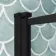 Oakham 1700 Space Saving Shower Bath & 6mm Easy Clean Matt Black Grid Bath Screen - Right Handed