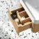 Cayman Natural Oak Wall Hung Slimline Basin Drawer Vanity 600mm - Black Accents