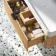 Cayman Natural Oak Wall Hung Slimline Basin Drawer Vanity 1000mm - Black Accents