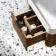Cayman Natural Walnut Wall Hung Slimline Basin Drawer Vanity 600mm - Black Accents