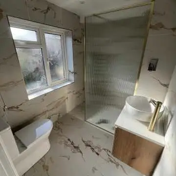Munich Fluted Effect Brushed Brass Easy Clean 8mm Wet Room Shower Glass Panel 900mm