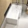L Shaped 1500 Shower Bath with Front Panel & 6mm Easy Clean Screen with Rail - Right Handed