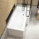 L Shaped 1700 Shower Bath with Front Panel & 6mm Easy Clean Matt Black Grid Bath Screen - Right Handed