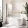 Turku 1500 Space Saving Shower Bath & 6mm Easy Clean Brushed Gunmetal Bath Screen - Left Handed
