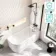 Turku 1600 Space Saving Shower Bath & 6mm Easy Clean Matt Black Bath Screen - Right Handed