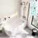 Turku 1700 Space Saving Shower Bath & 6mm Easy Clean Brushed Gunmetal Folding Bath Screen - Right