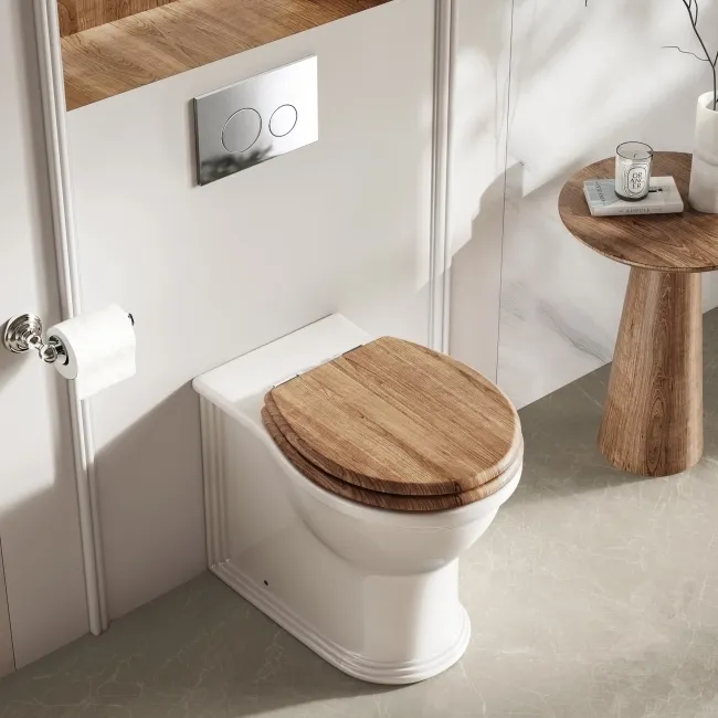 Alma Traditional Rimless Back To Wall Toilet With Oak Effect Wooden Soft Close Seat