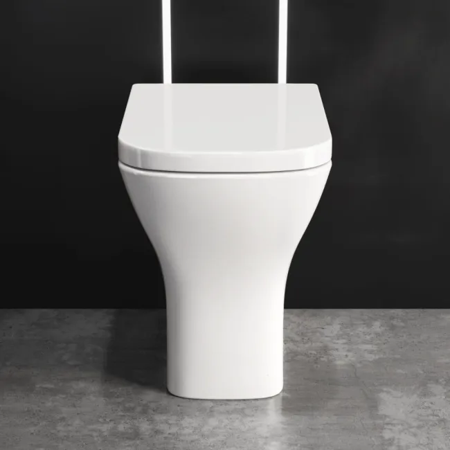 Atlanta Rimless Comfort Height Back To Wall Toilet With Premium Soft Close Seat