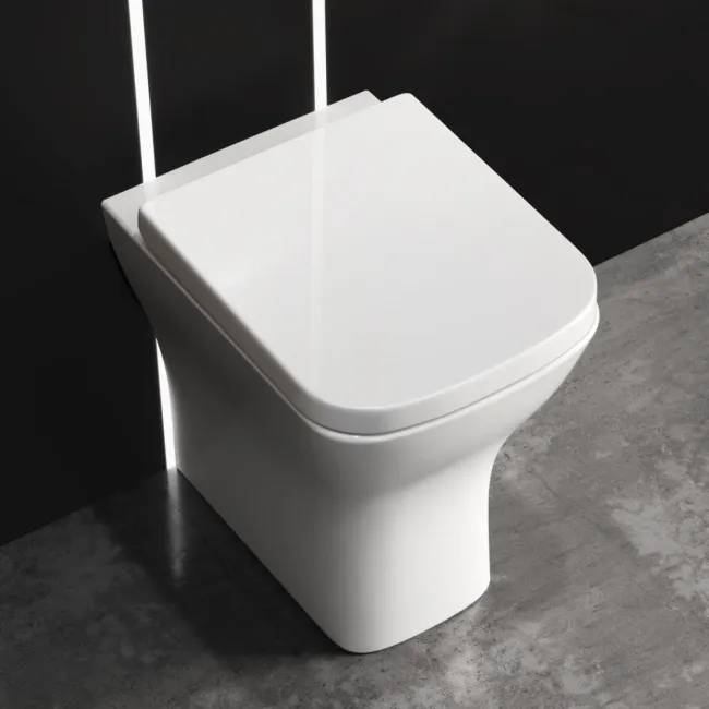 Atlanta Rimless Comfort Height Back To Wall Toilet With Premium Soft Close Seat