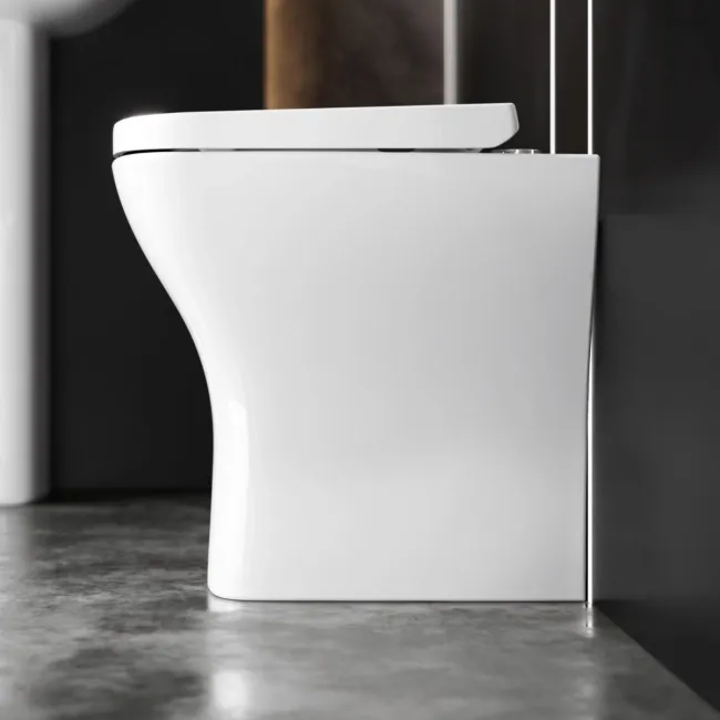 Atlanta Rimless Comfort Height Back To Wall Toilet With Premium Soft Close Seat