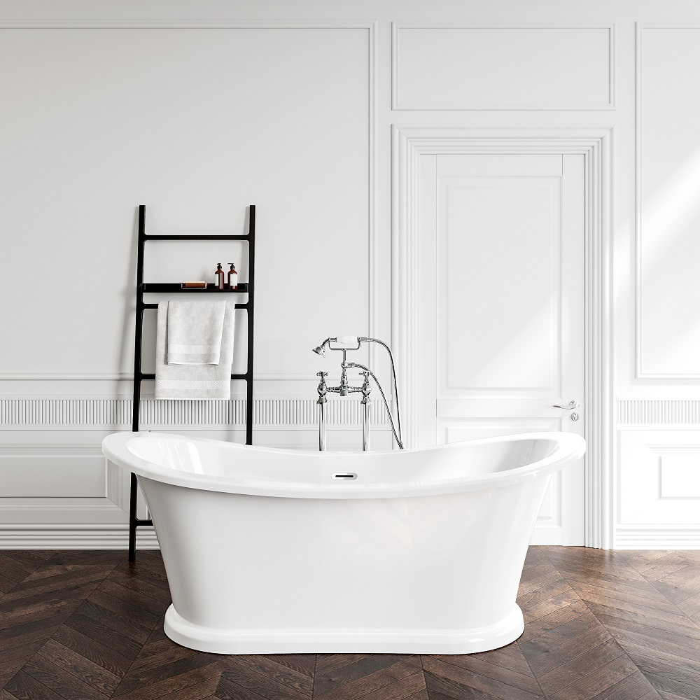 Elegant modern white slipper freestanding bathtub in a bright minimalist bathroom with herringbone parquet flooring, white wainscoting panels, and a sleek black towel ladder.