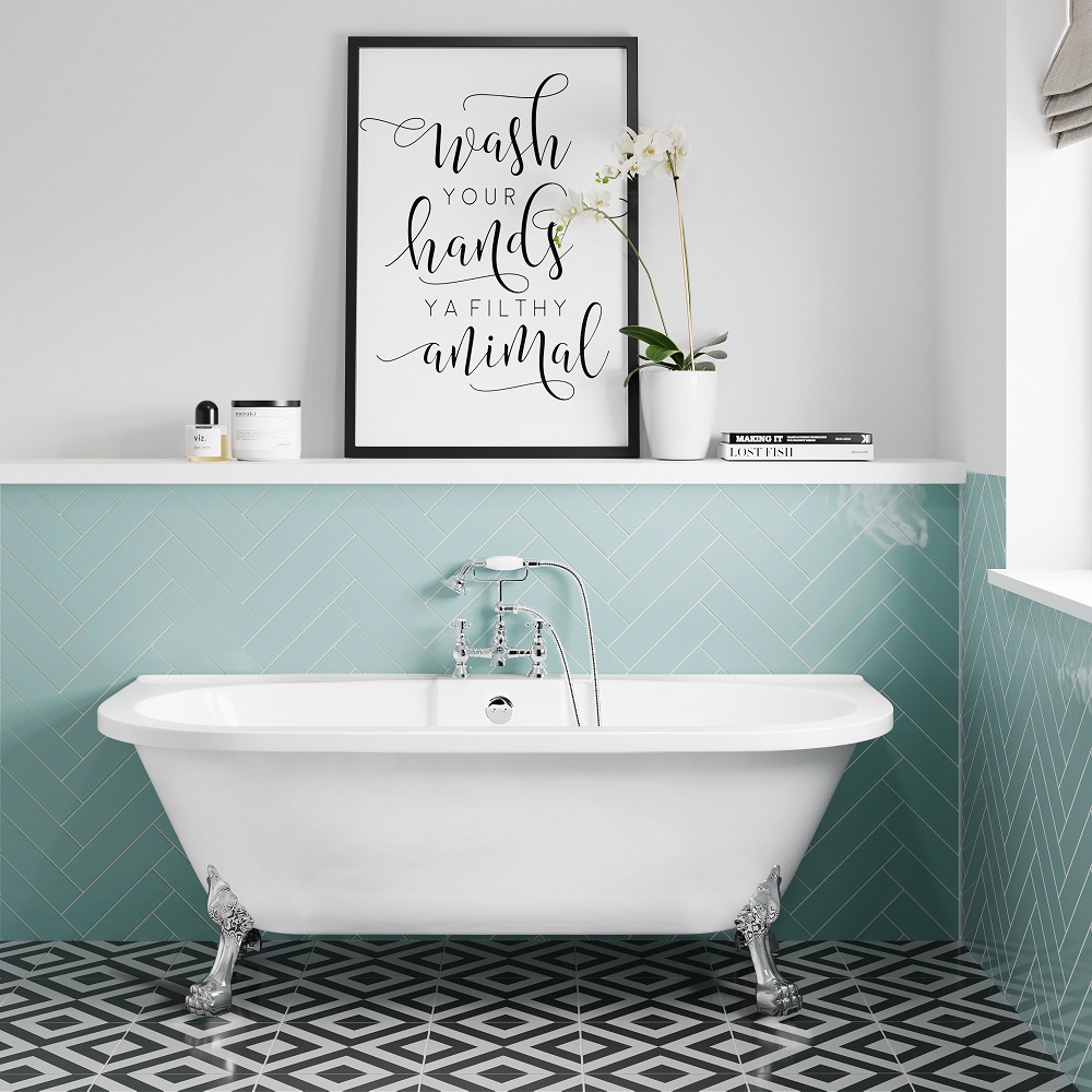 Contemporary back to wall freestanding bathub for roll top bath ideas with elegant silver claw feet, paired with a playful 'wash your hands ya filthy animal' framed quote, against a herringbone patterned teal tile wall and geometric floor tiles, bringing a fresh, modern twist to classic bathroom design. 